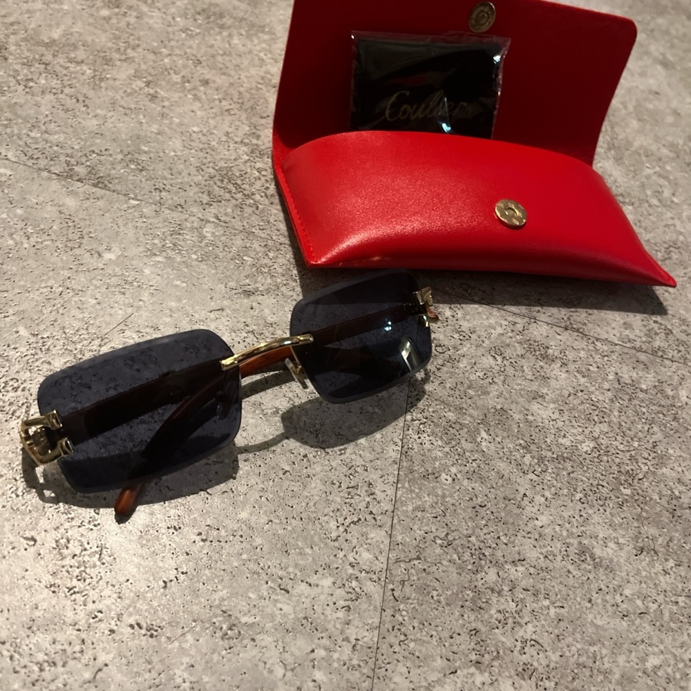 Cartier frames with Elegant Gold-Trimmed Sunglasses with Red Case